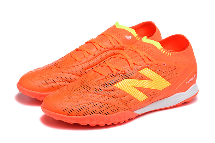 Chuteira Society New Balance Tekela Pro Low Laced FG V4+ - Laranja