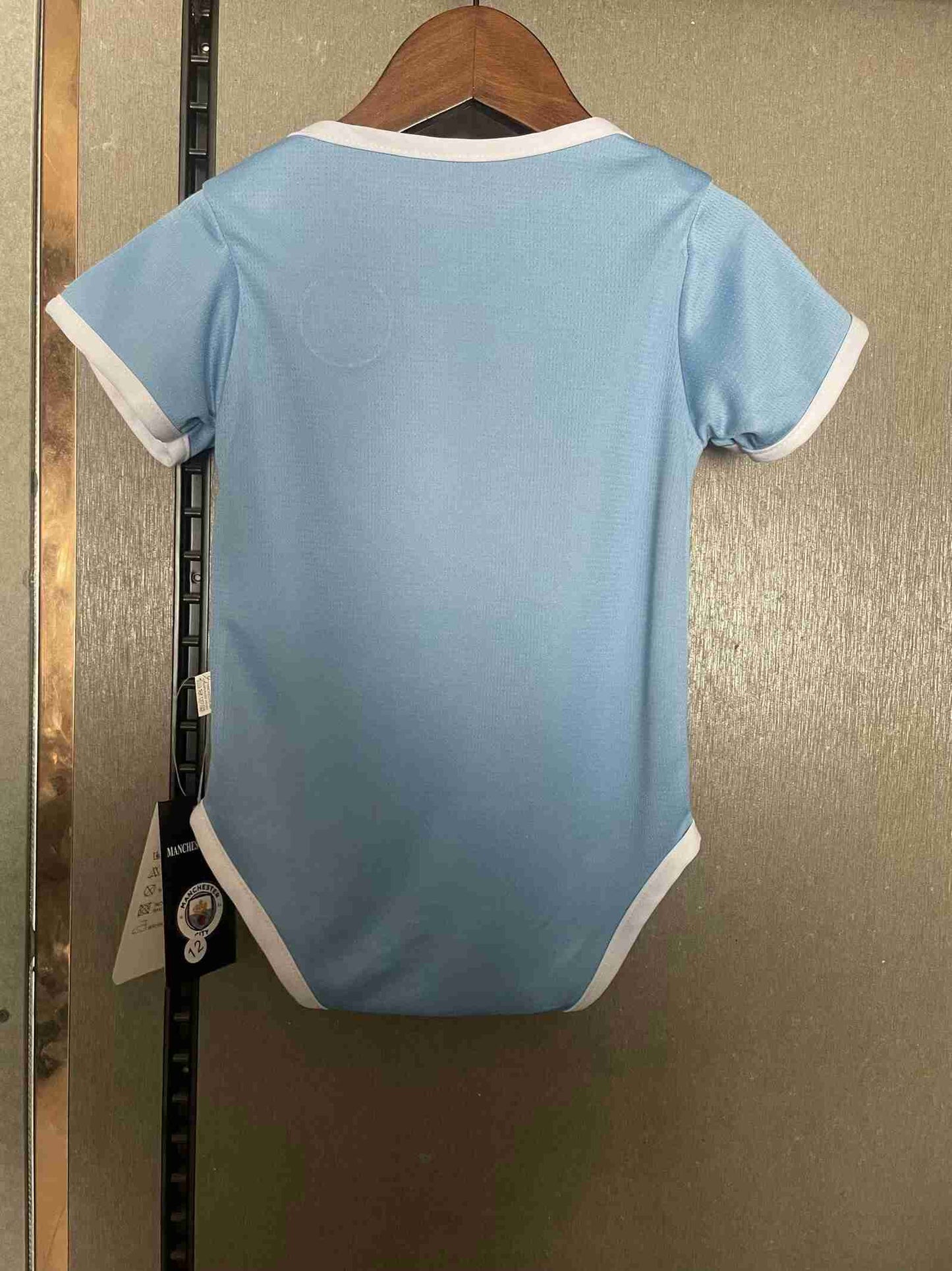 Body Bebê Infantil Manchester City Home 25/26 - Azul Claro