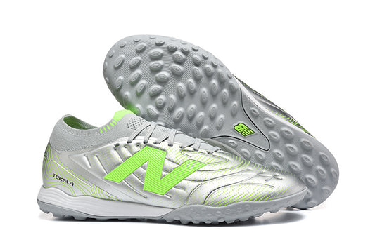 Chuteira Society New Balance Tekela Pro Low Laced FG V4+ - Cinza e Verde
