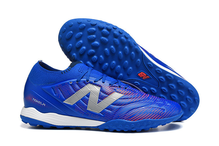 Chuteira Society New Balance Tekela Pro Low Laced FG V4+ - Azul