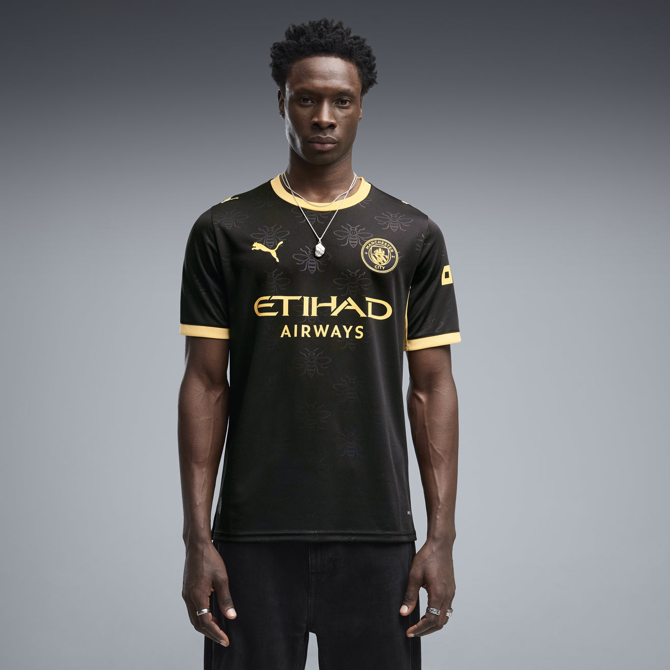 Manchester City Away 26/27 Torcedor Puma - Preto e Dourada