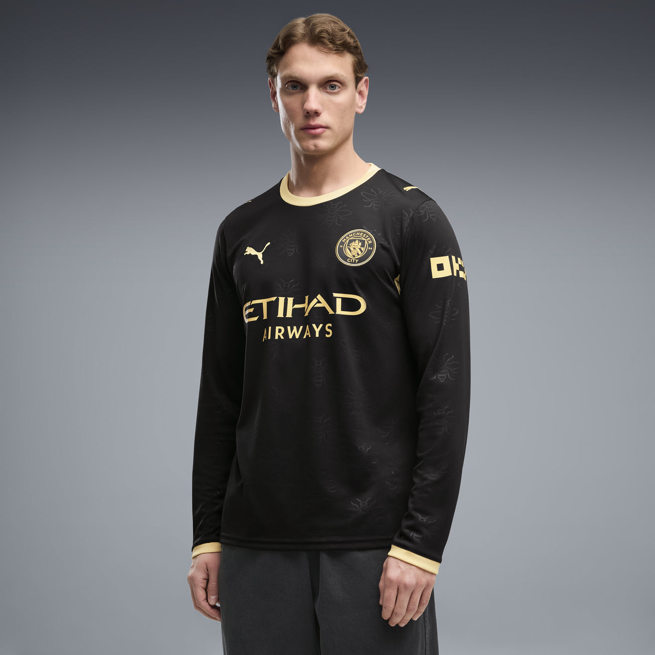 Manchester City Away Manga Longa 26/27 Torcedor Puma - Preto e Dourado
