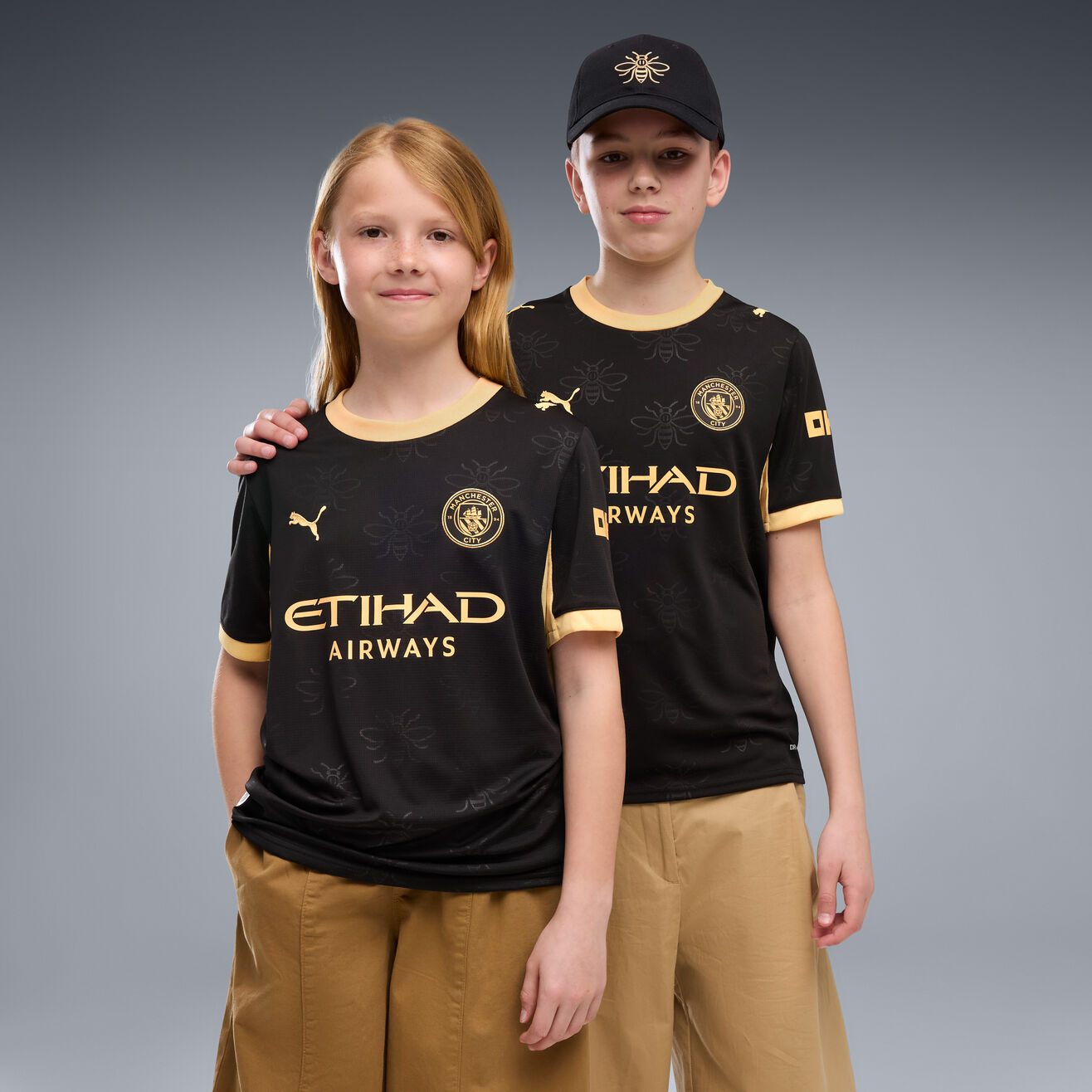 Kit Infantil Manchester City Away 26/27 - Preto e Dourado