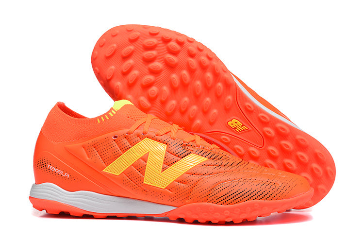 Chuteira Society New Balance Tekela Pro Low Laced FG V4+ - Laranja
