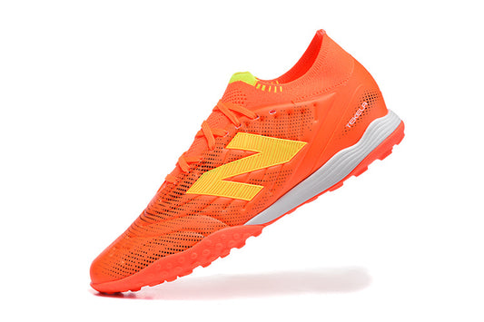 Chuteira Society New Balance Tekela Pro Low Laced FG V4+ - Laranja