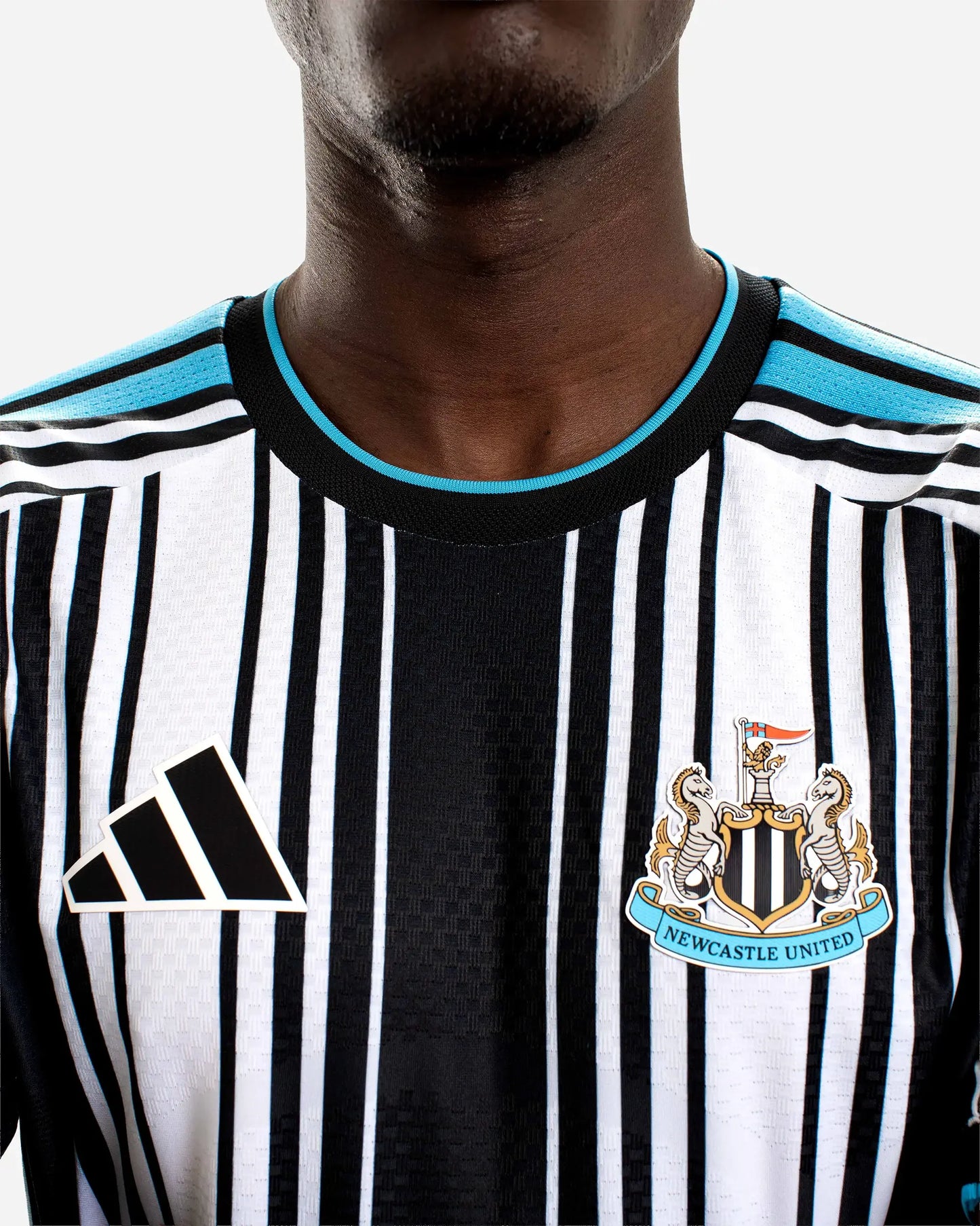 Newcastle Home 26/27 Jogador Adidas - Preto e Branco