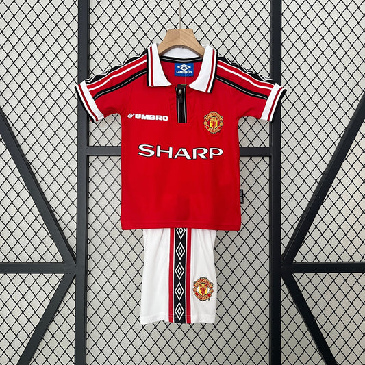 Kit infantil Manchester United Retrô Home 1999 . - Vermelho