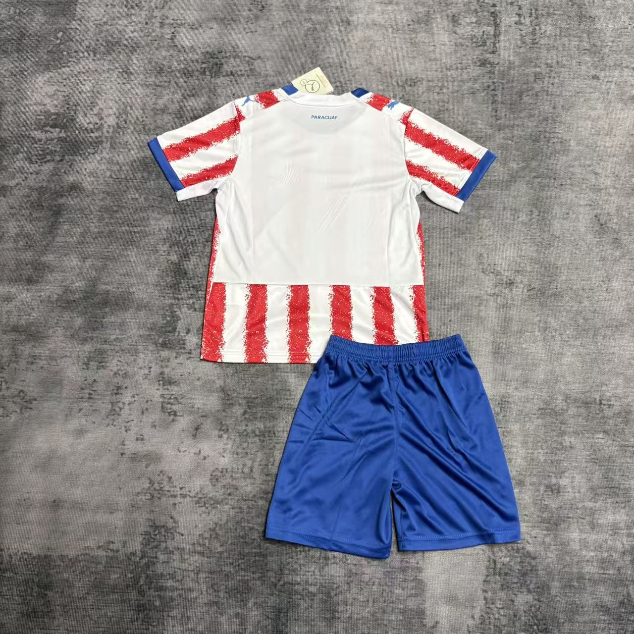 Kit Infantil Paraguai Home 26/27 - Branco e Vermelho